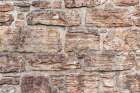 Dumfries, Dumfries and Galloway, Scotland. Stone wall at the ruins of Caerlaverock Castle. Art Print
